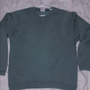 An olive green crewneck sweatshirt